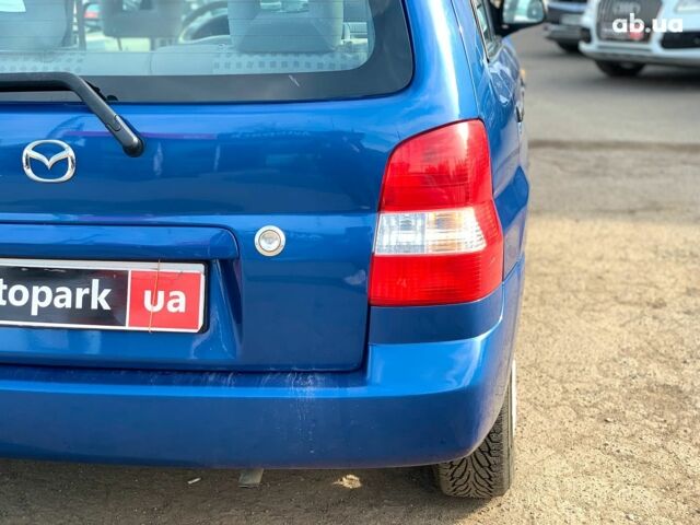 Синій Мазда Деміо, об'ємом двигуна 1.5 л та пробігом 73 тис. км за 4190 $, фото 10 на Automoto.ua
