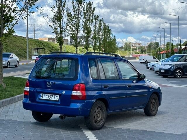 Синий Мазда Демио, объемом двигателя 1.5 л и пробегом 195 тыс. км за 2300 $, фото 3 на Automoto.ua
