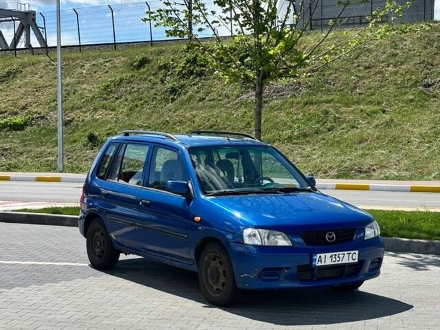 Синий Мазда Демио, объемом двигателя 1.5 л и пробегом 195 тыс. км за 2300 $, фото 1 на Automoto.ua