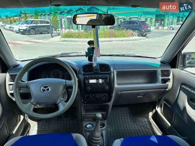 Синій Мазда Деміо, об'ємом двигуна 1.5 л та пробігом 195 тис. км за 2300 $, фото 14 на Automoto.ua