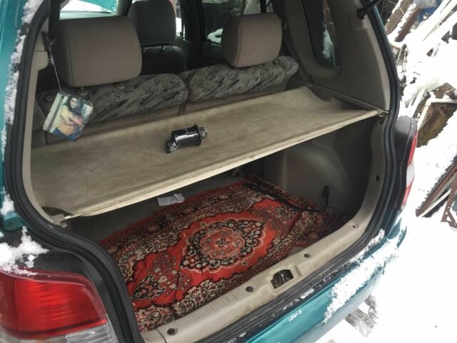 Зеленый Мазда Демио, объемом двигателя 1.3 л и пробегом 180 тыс. км за 1000 $, фото 11 на Automoto.ua