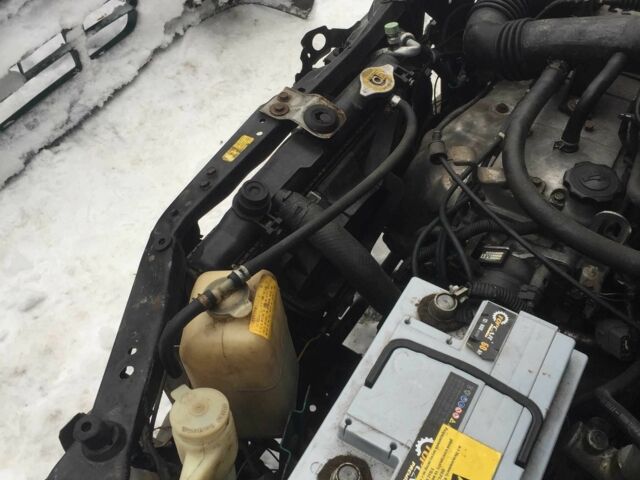 Зеленый Мазда Демио, объемом двигателя 1.3 л и пробегом 180 тыс. км за 1000 $, фото 6 на Automoto.ua