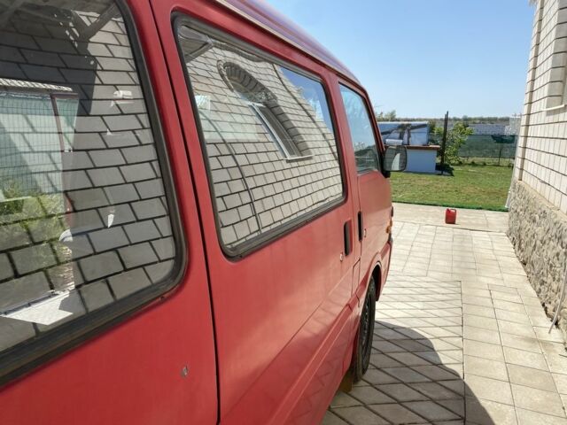 Красный Мазда E 2000, объемом двигателя 2 л и пробегом 276 тыс. км за 3100 $, фото 8 на Automoto.ua