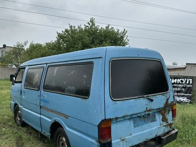Синій Мазда E 2000, об'ємом двигуна 2 л та пробігом 300 тис. км за 500 $, фото 3 на Automoto.ua