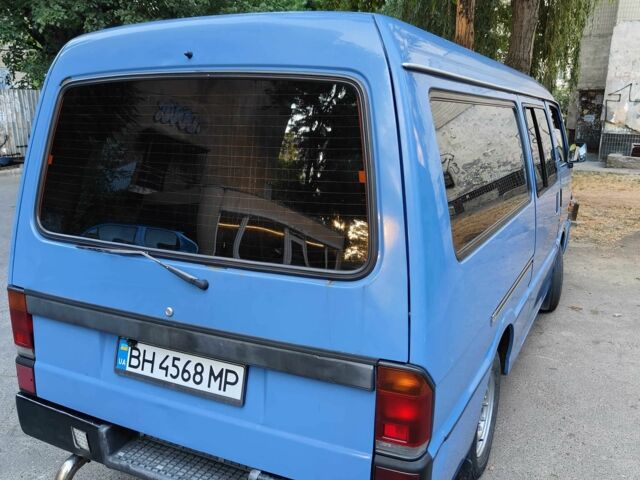 Синій Мазда E 2000, об'ємом двигуна 2.2 л та пробігом 297 тис. км за 4300 $, фото 3 на Automoto.ua