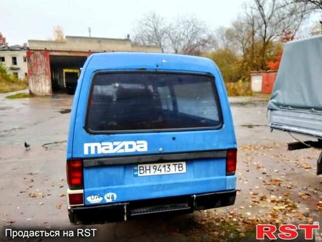 Синий Мазда Е2200, объемом двигателя 2.2 л и пробегом 168 тыс. км за 1400 $, фото 2 на Automoto.ua