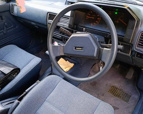 Белый Мазда Фамилия, объемом двигателя 1.5 л и пробегом 136 тыс. км за 5500 $, фото 7 на Automoto.ua