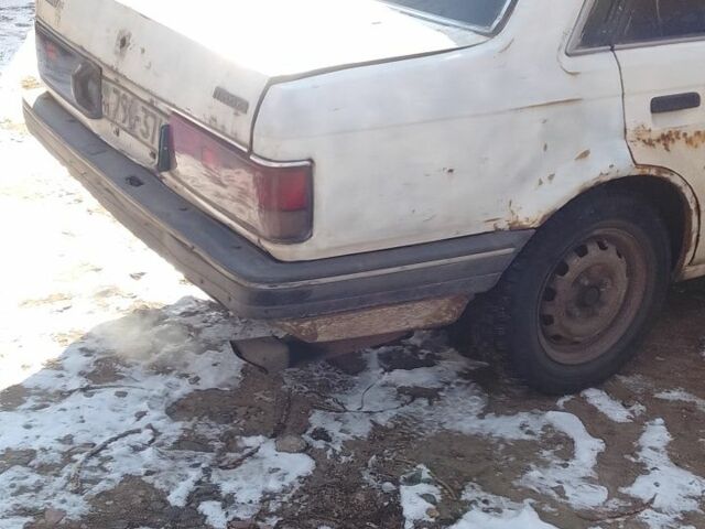 Белый Мазда Фамилия, объемом двигателя 0 л и пробегом 490 тыс. км за 605 $, фото 2 на Automoto.ua