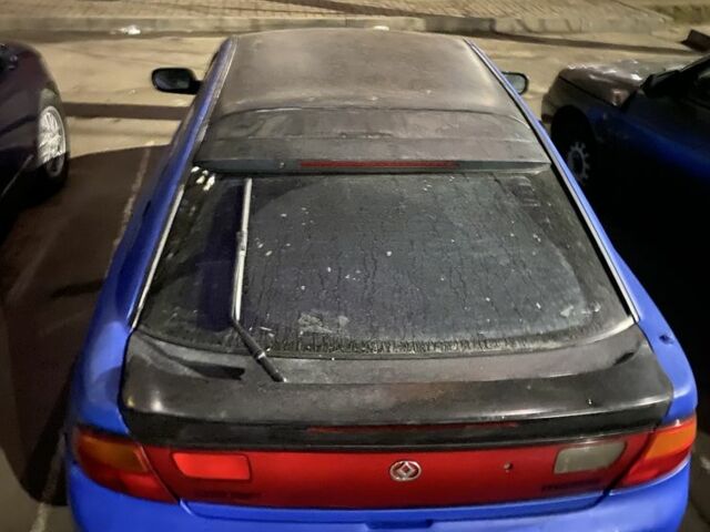 Синий Мазда Лантис, объемом двигателя 1.5 л и пробегом 3 тыс. км за 1500 $, фото 4 на Automoto.ua