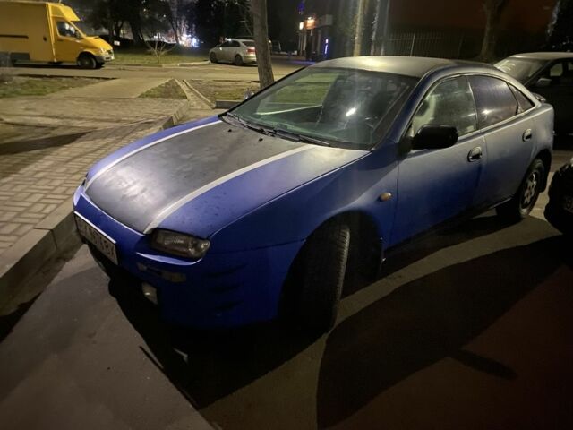 Синий Мазда Лантис, объемом двигателя 1.5 л и пробегом 3 тыс. км за 1500 $, фото 1 на Automoto.ua