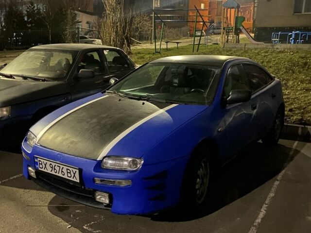 Синий Мазда Лантис, объемом двигателя 1.5 л и пробегом 3 тыс. км за 1500 $, фото 6 на Automoto.ua