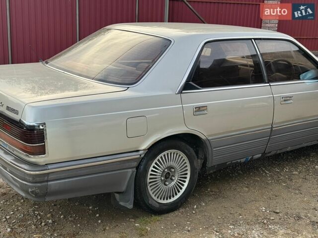 Мазда Люси, объемом двигателя 2 л и пробегом 300 тыс. км за 700 $, фото 2 на Automoto.ua