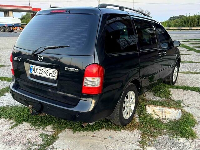 Чорний Мазда МПВ, об'ємом двигуна 2 л та пробігом 358 тис. км за 5300 $, фото 4 на Automoto.ua
