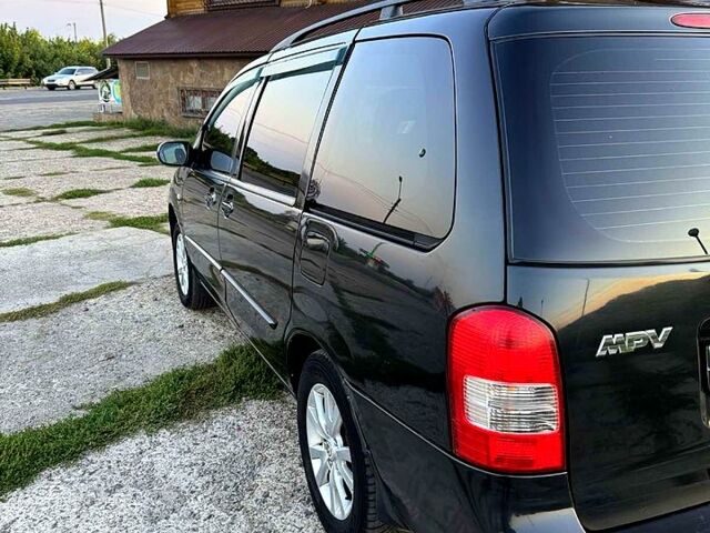 Чорний Мазда МПВ, об'ємом двигуна 2 л та пробігом 358 тис. км за 5300 $, фото 3 на Automoto.ua