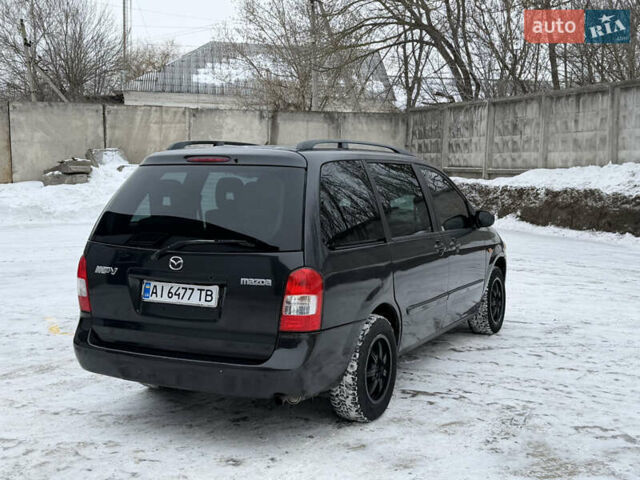 Чорний Мазда МПВ, об'ємом двигуна 1.99 л та пробігом 176 тис. км за 3150 $, фото 4 на Automoto.ua