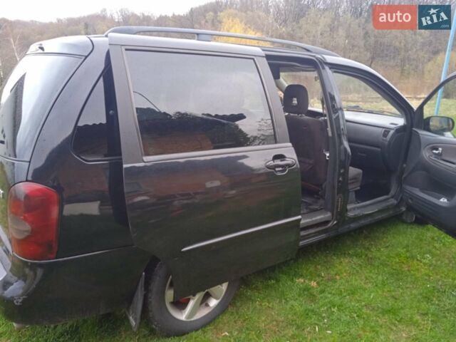 Чорний Мазда МПВ, об'ємом двигуна 2 л та пробігом 320 тис. км за 3999 $, фото 8 на Automoto.ua