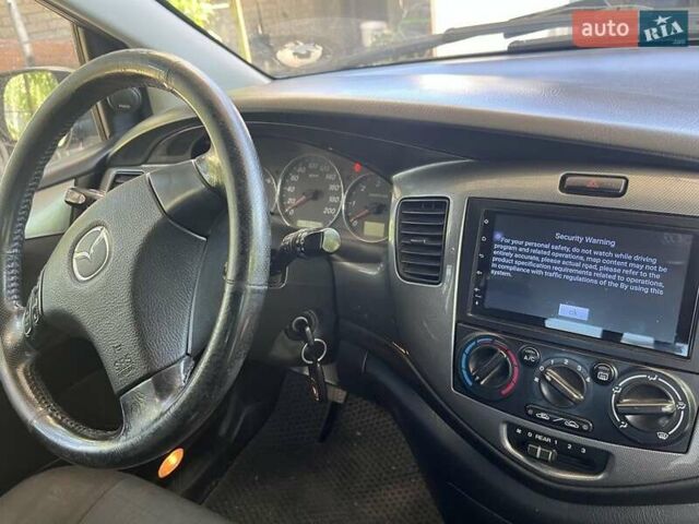 Чорний Мазда МПВ, об'ємом двигуна 2 л та пробігом 350 тис. км за 4916 $, фото 2 на Automoto.ua