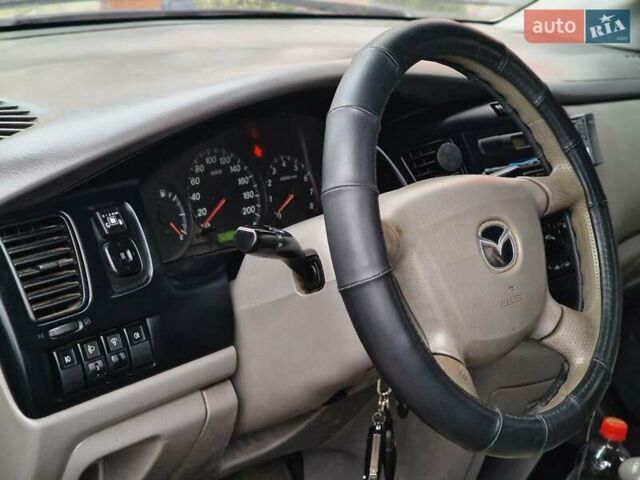 Серый Мазда МПВ, объемом двигателя 2 л и пробегом 324 тыс. км за 2700 $, фото 3 на Automoto.ua