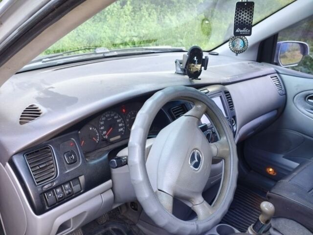 Сірий Мазда МПВ, об'ємом двигуна 2 л та пробігом 425 тис. км за 3046 $, фото 3 на Automoto.ua