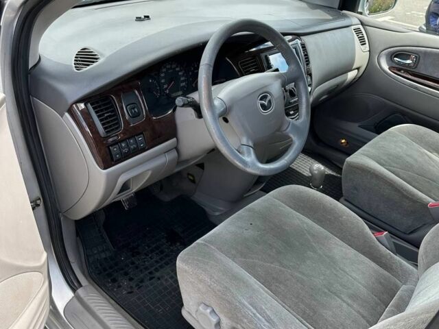 Сірий Мазда МПВ, об'ємом двигуна 2 л та пробігом 298 тис. км за 4211 $, фото 3 на Automoto.ua