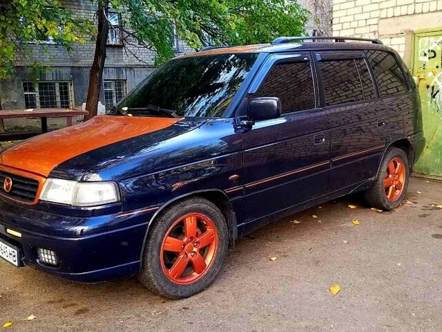 Синий Мазда МПВ, объемом двигателя 2.5 л и пробегом 130 тыс. км за 5000 $, фото 1 на Automoto.ua
