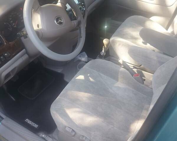 Зелений Мазда МПВ, об'ємом двигуна 2 л та пробігом 340 тис. км за 4300 $, фото 9 на Automoto.ua