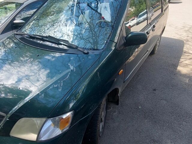 Зеленый Мазда МПВ, объемом двигателя 2 л и пробегом 300 тыс. км за 2500 $, фото 4 на Automoto.ua