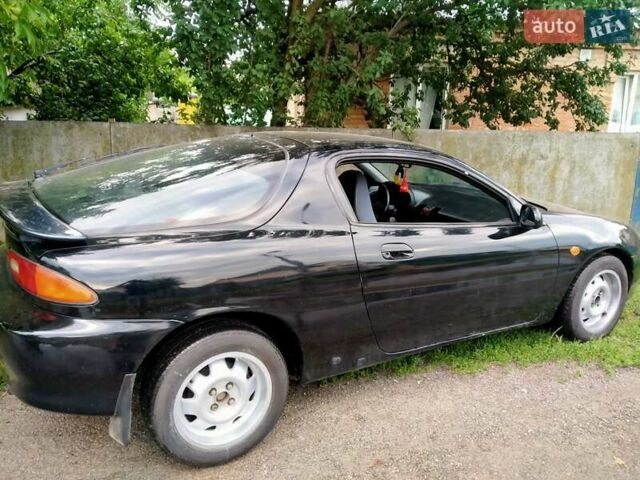 Черный Мазда МХ-3, объемом двигателя 1.8 л и пробегом 280 тыс. км за 2500 $, фото 6 на Automoto.ua