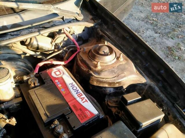 Черный Мазда МХ-3, объемом двигателя 1.8 л и пробегом 280 тыс. км за 2500 $, фото 10 на Automoto.ua