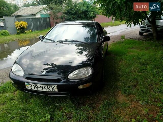 Черный Мазда МХ-3, объемом двигателя 1.8 л и пробегом 280 тыс. км за 2500 $, фото 9 на Automoto.ua