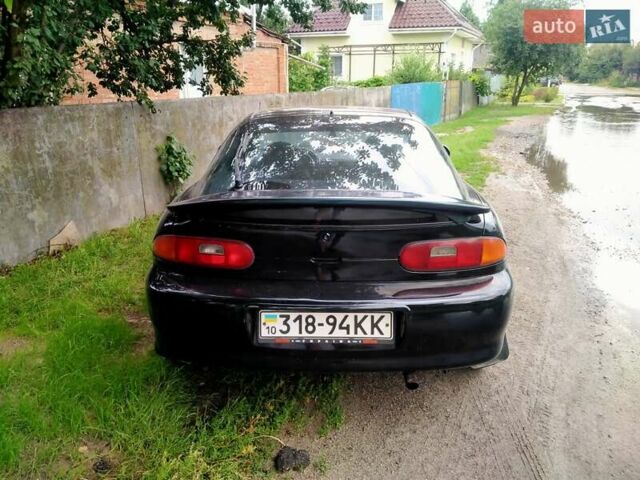 Черный Мазда МХ-3, объемом двигателя 1.8 л и пробегом 280 тыс. км за 2500 $, фото 7 на Automoto.ua