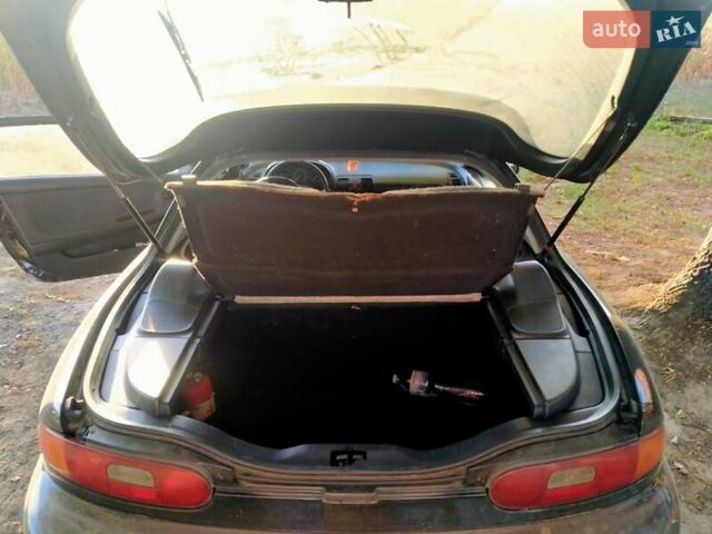 Черный Мазда МХ-3, объемом двигателя 1.8 л и пробегом 280 тыс. км за 2500 $, фото 12 на Automoto.ua