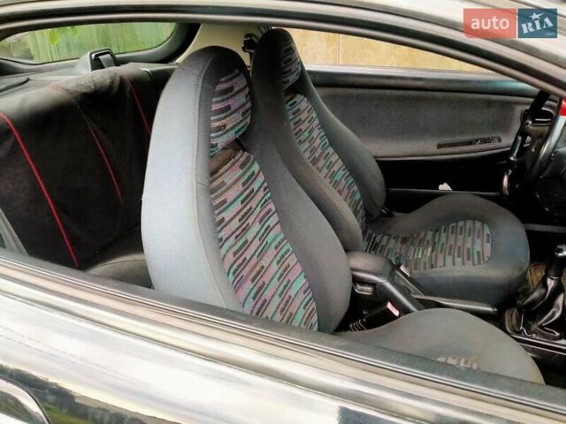 Черный Мазда МХ-3, объемом двигателя 1.8 л и пробегом 280 тыс. км за 2500 $, фото 1 на Automoto.ua