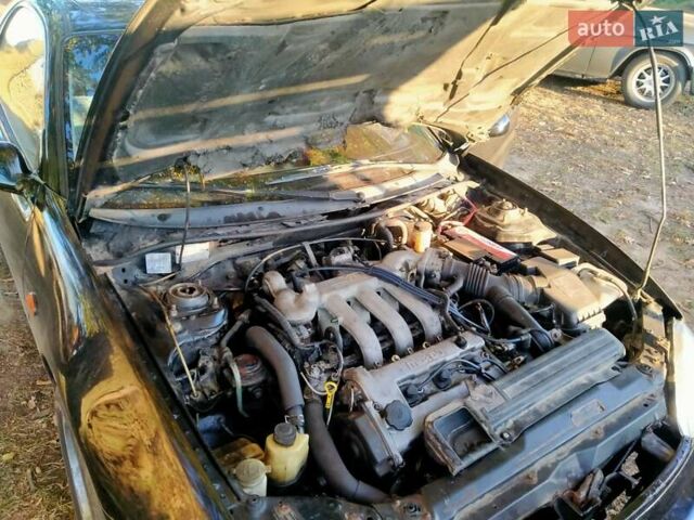 Черный Мазда МХ-3, объемом двигателя 1.8 л и пробегом 280 тыс. км за 2500 $, фото 8 на Automoto.ua