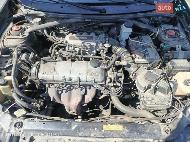 Чорний Мазда МХ-3, об'ємом двигуна 1.6 л та пробігом 196 тис. км за 3000 $, фото 13 на Automoto.ua