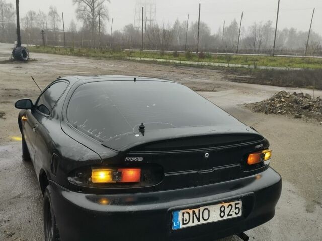 Черный Мазда МХ-3, объемом двигателя 1.6 л и пробегом 320 тыс. км за 593 $, фото 3 на Automoto.ua