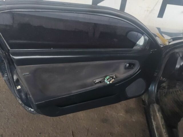 Черный Мазда МХ-3, объемом двигателя 1.6 л и пробегом 320 тыс. км за 593 $, фото 7 на Automoto.ua