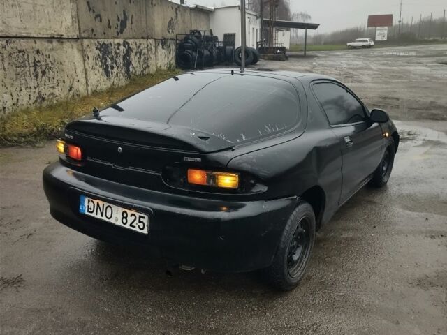 Черный Мазда МХ-3, объемом двигателя 1.6 л и пробегом 320 тыс. км за 593 $, фото 2 на Automoto.ua