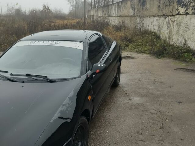 Черный Мазда МХ-3, объемом двигателя 1.6 л и пробегом 320 тыс. км за 593 $, фото 5 на Automoto.ua