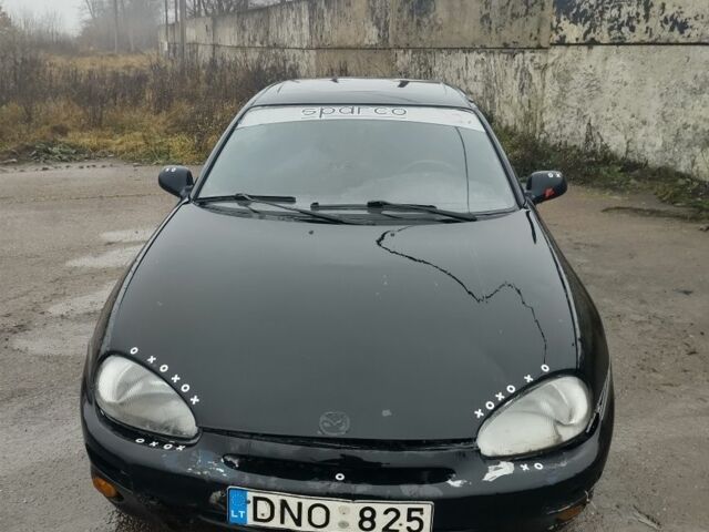 Черный Мазда МХ-3, объемом двигателя 1.6 л и пробегом 320 тыс. км за 593 $, фото 4 на Automoto.ua