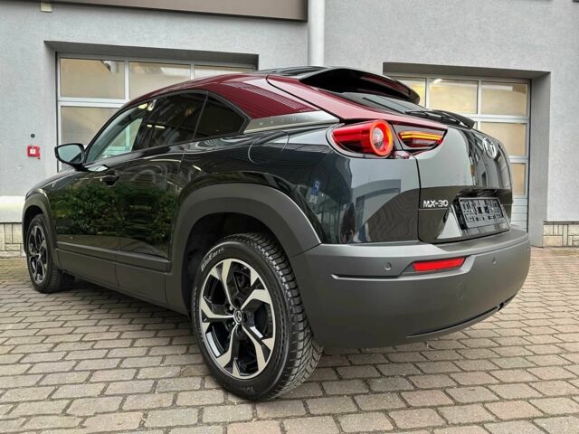 Черный Мазда МХ-3, объемом двигателя 0.8 л и пробегом 23 тыс. км за 10400 $, фото 4 на Automoto.ua