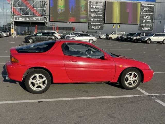 Красный Мазда МХ-3, объемом двигателя 1.6 л и пробегом 257 тыс. км за 1600 $, фото 3 на Automoto.ua