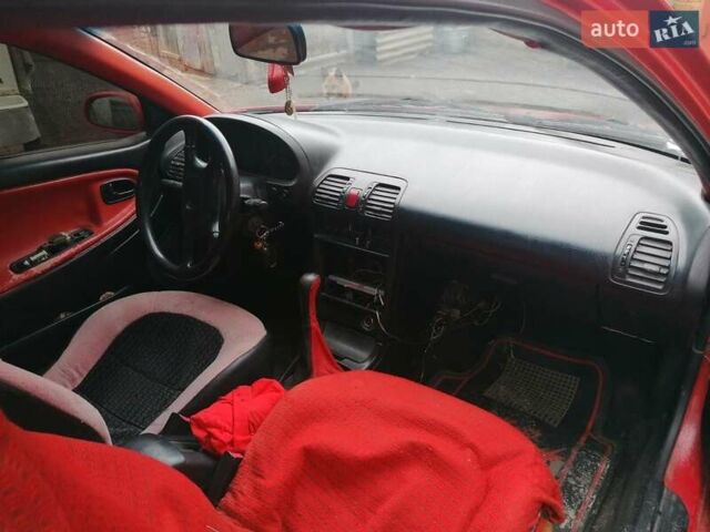 Красный Мазда МХ-3, объемом двигателя 1.8 л и пробегом 294 тыс. км за 2500 $, фото 7 на Automoto.ua