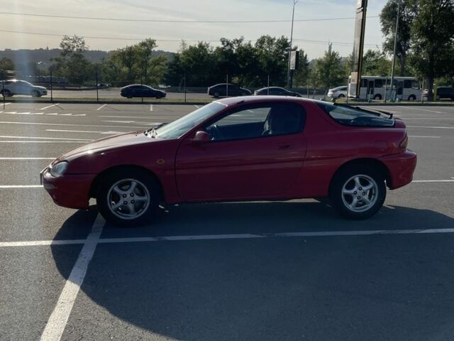 Красный Мазда МХ-3, объемом двигателя 1.6 л и пробегом 257 тыс. км за 1600 $, фото 2 на Automoto.ua