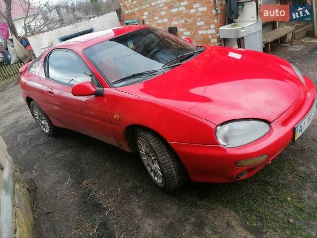 Красный Мазда МХ-3, объемом двигателя 1.8 л и пробегом 294 тыс. км за 2500 $, фото 9 на Automoto.ua