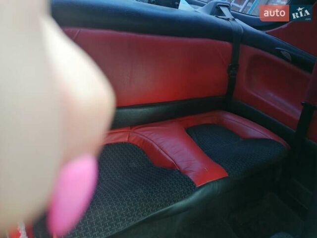 Красный Мазда МХ-3, объемом двигателя 1.8 л и пробегом 294 тыс. км за 2500 $, фото 8 на Automoto.ua