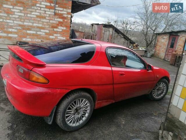 Красный Мазда МХ-3, объемом двигателя 1.8 л и пробегом 294 тыс. км за 2500 $, фото 3 на Automoto.ua
