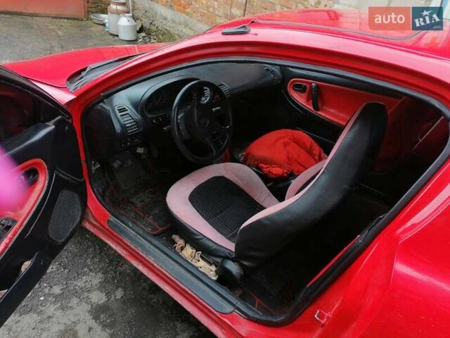 Красный Мазда МХ-3, объемом двигателя 1.8 л и пробегом 294 тыс. км за 2500 $, фото 5 на Automoto.ua