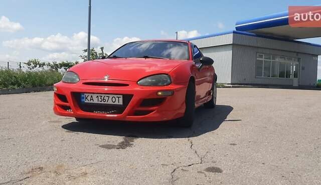 Красный Мазда МХ-3, объемом двигателя 1.8 л и пробегом 440 тыс. км за 3100 $, фото 4 на Automoto.ua