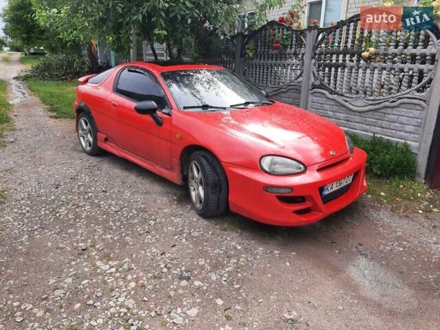 Красный Мазда МХ-3, объемом двигателя 1.8 л и пробегом 440 тыс. км за 3100 $, фото 10 на Automoto.ua